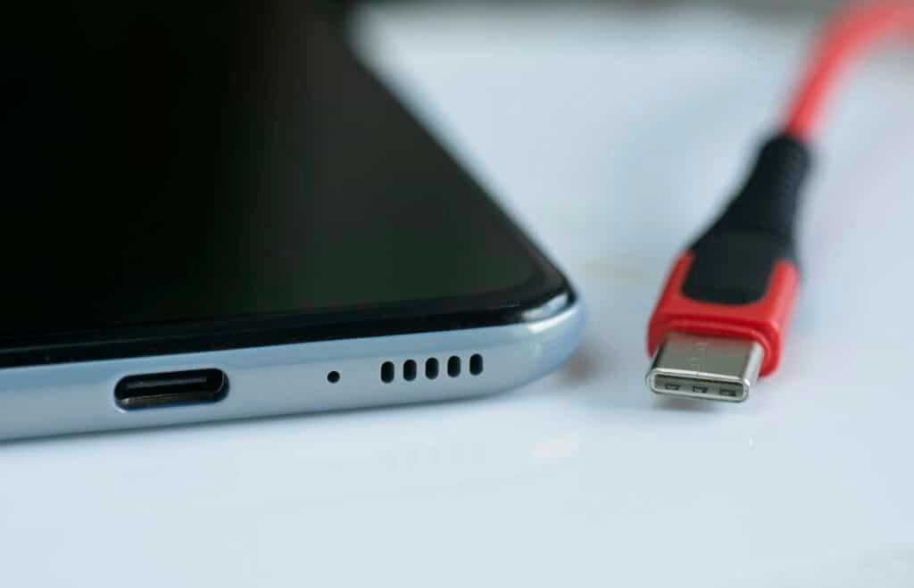 Detail of front entrance of USB versus USB-C cable plugs
